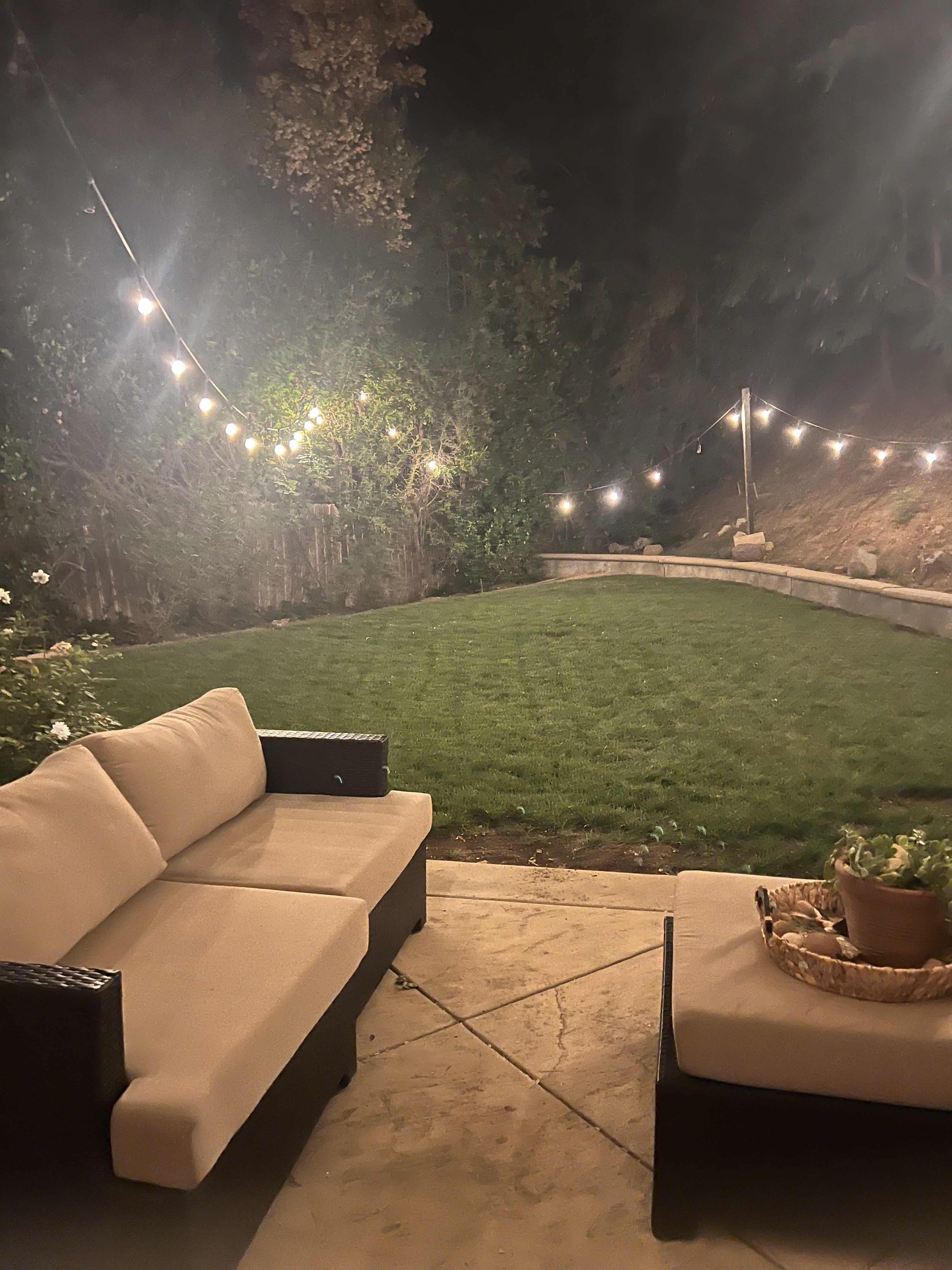 Evening patio seating and lawn